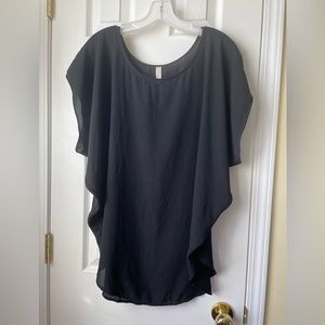 Women’s black flowing top